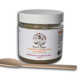 A jar of Eloise Naturals Pure Pits Forest Pine Aluminum Free Deodorant with a white lid and a small wooden spoon in front, on a white background.